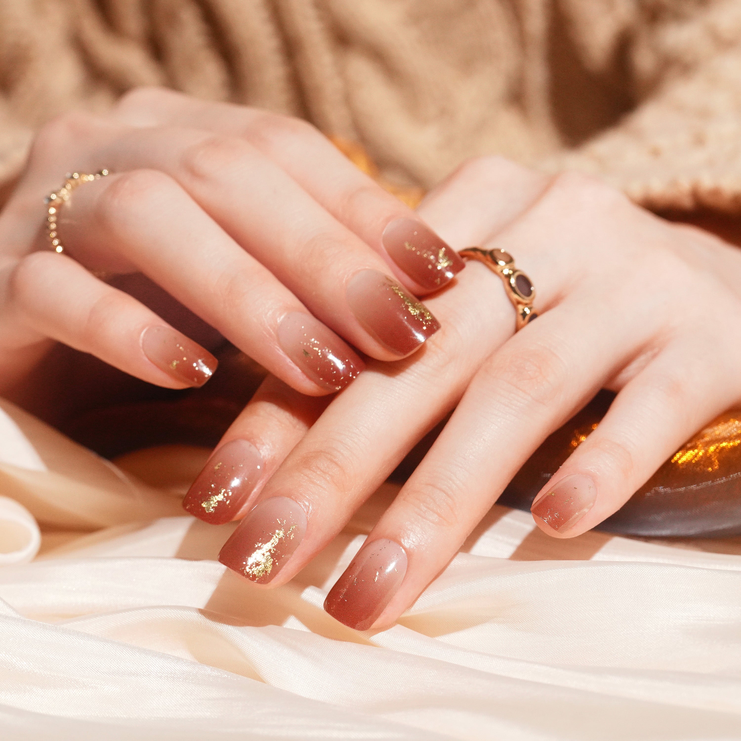 Warm Red-Brown Gel Nail Strips with Shimmering Gold Accents | Golden Ember-2844